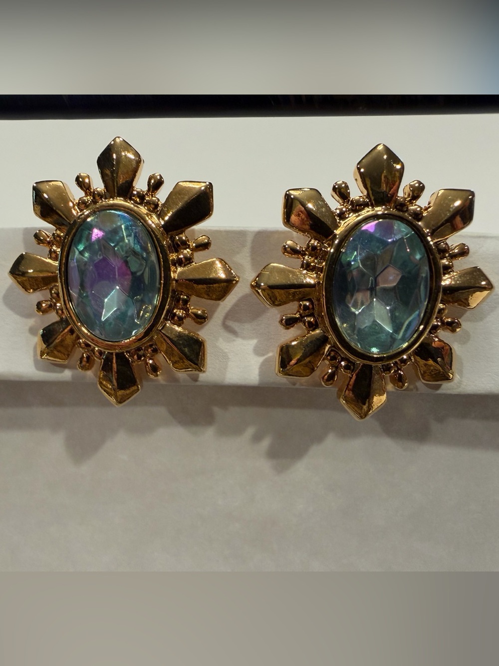 Vintage Avon Blue Mesmerize Starburst Faux Aquamarine Gold Tone Clip-On Earrings